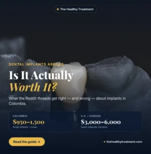 Dental implant crown seated on a dark dental cast model — dental implants abroad cost guide by The Healthy Treatment.